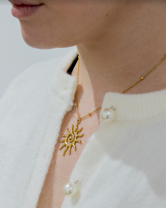 Spiral sun necklace